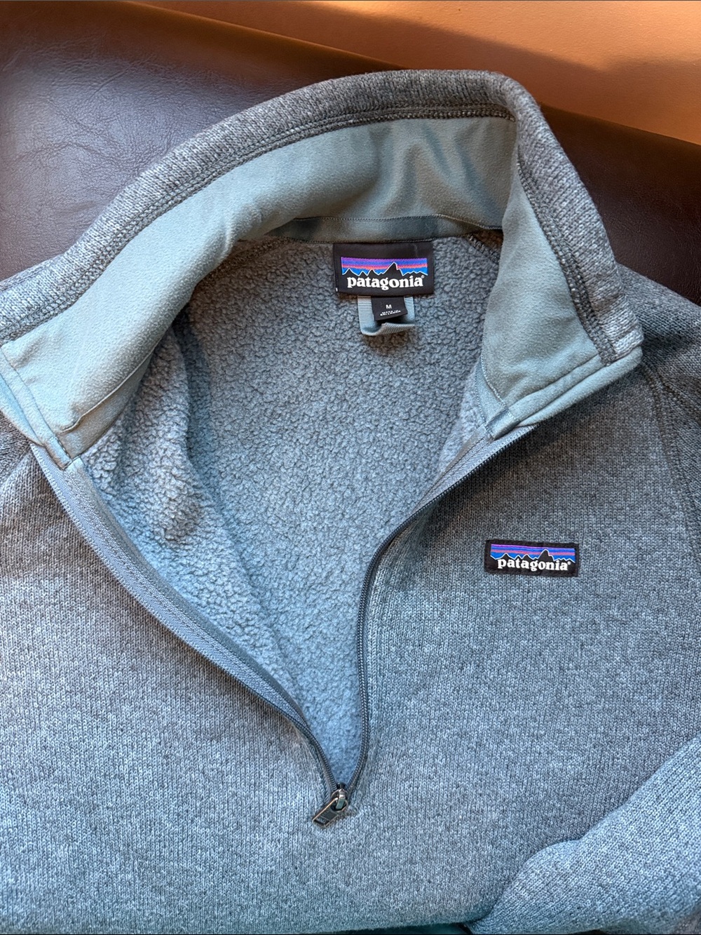 Patagonia women’s Heather Teal Half-Zip Sweater